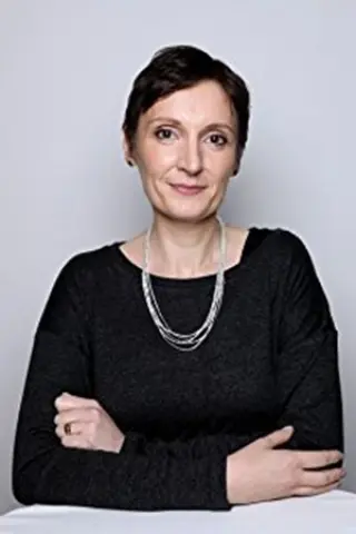 Нора Тумі