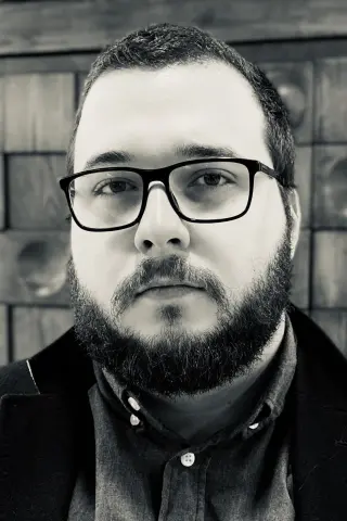 Метью Райсан