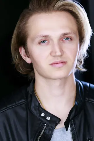 Олександр Карстою